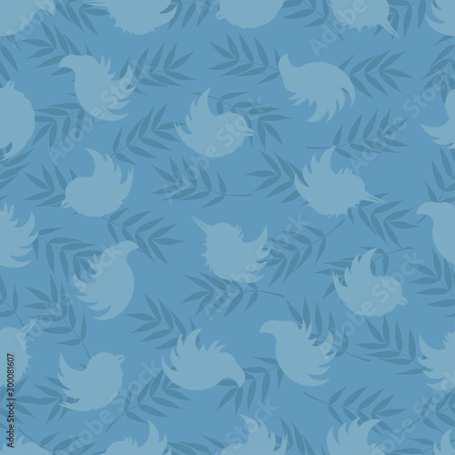 Seamless pattern of silhouettes of birds and rowan leaves in soft blue tones © Lastovetskiy
