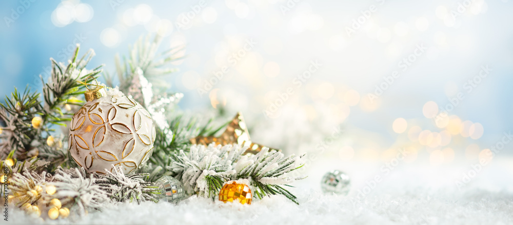 Christmas winter background with Christmas baubles and fir tree branches on snow. - obrazy, fototapety, plakaty 