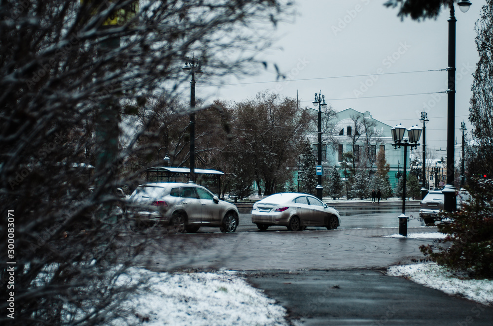 Autumn in a Siberian city. First snow.