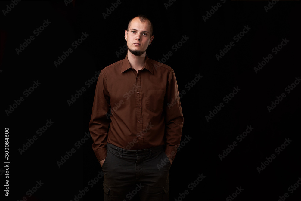 Close up Fashion Shot of a Young Man A trendy European man dressed in contemporary cloth. Portrait of a nice guy. successful guy. He is now a professional model.