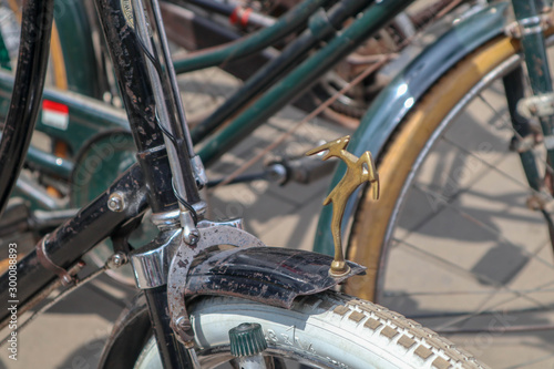 Selective Focus handlebar Retro styled of a nineteenth century bicycle on indonesian city