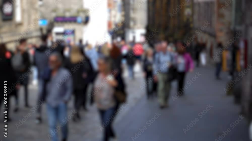 Anonymous Out of Focus Crowd of People Walking in Generic British City Anonymous Out of Focus Crowd of People Walking in Generic British City