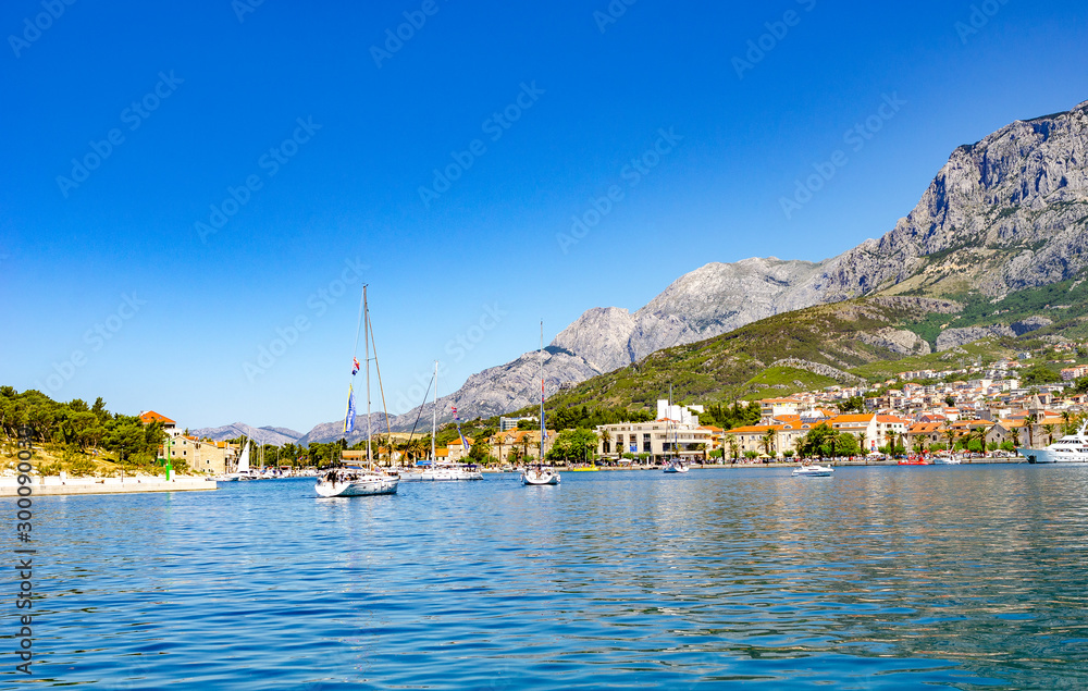 View of the resort town of Makarska on a summer day, in Makarska Riviera, Croatia.