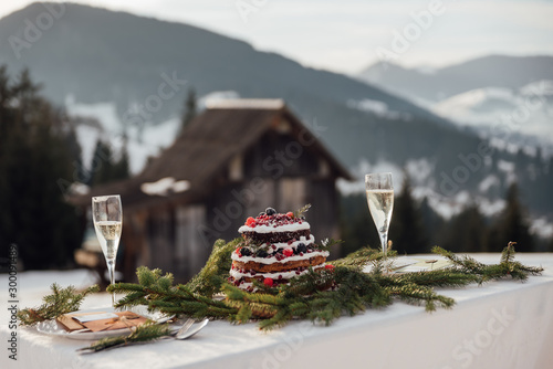 Sweet wedding decor in the winter style in the mountains