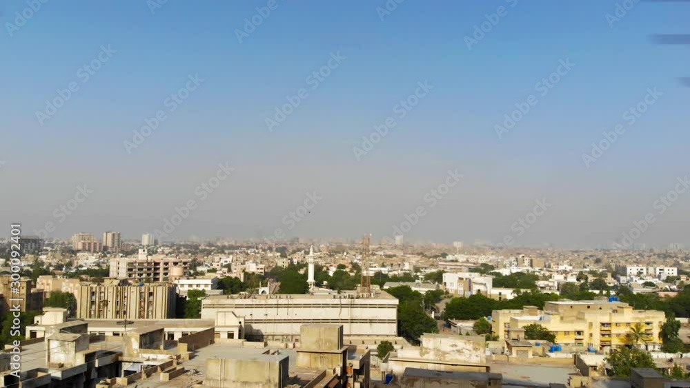 Defence - Top Aerial View Of Karachi City With Trees Between Buildings - Backwards Defence - Top Aerial View Of Karachi City With Trees Between Buildings - Backwards