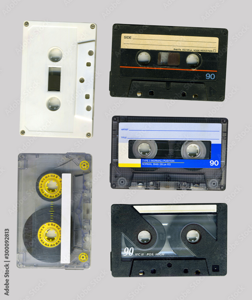 Naklejka premium Collection of retro audio tapes isolated on grey background
