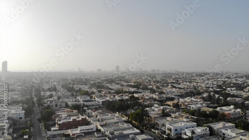 Defence - Top Aerial View of the City of Karachi with skyscrapers view and beautiful skies - Dolly Left To Right  photo