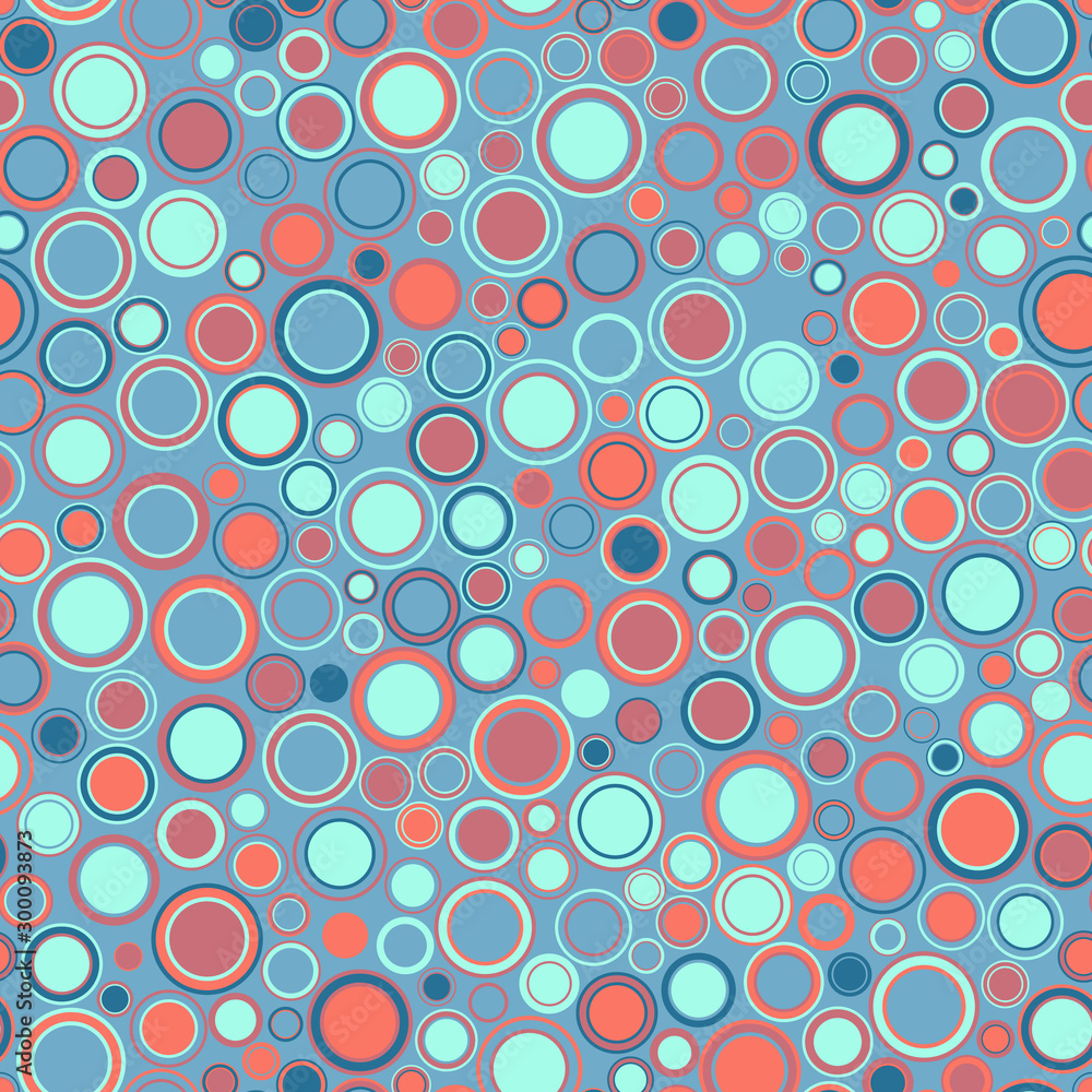 Seamless pattern. Consists of geometric figures having round shape and different color, located on a blue background. Useful as design element for texture and artistic composition. Seamless pattern. Consists of geometric figures having round shape and different color, located on a blue background. Useful as design element for texture and artistic composition.