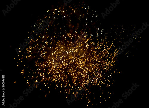 Light golden Sparkle fireworks for celebrations on black background