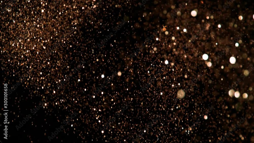 Golden Glitter Background in Super Slow Motion at 1000fps. Golden Glitter Background in Super Slow Motion at 1000fps.