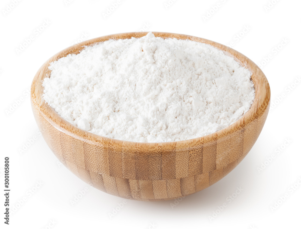 Wheat flour in wooden bowl isolated on white background with clipping path Wheat flour in wooden bowl isolated on white background with clipping path