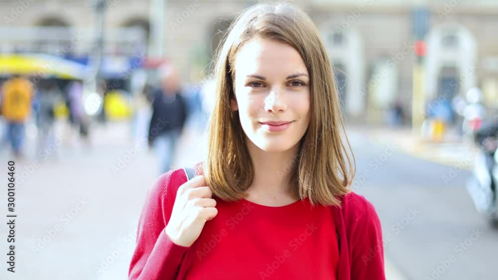 Young woman walking in the city in casual cloths Young woman walking in the city in casual cloths