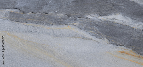 grey marble texture background with brown curly veins, rustic marble with cracked, it can be used for interior-exterior home decoration and ceramic tile surface, wallpaper.