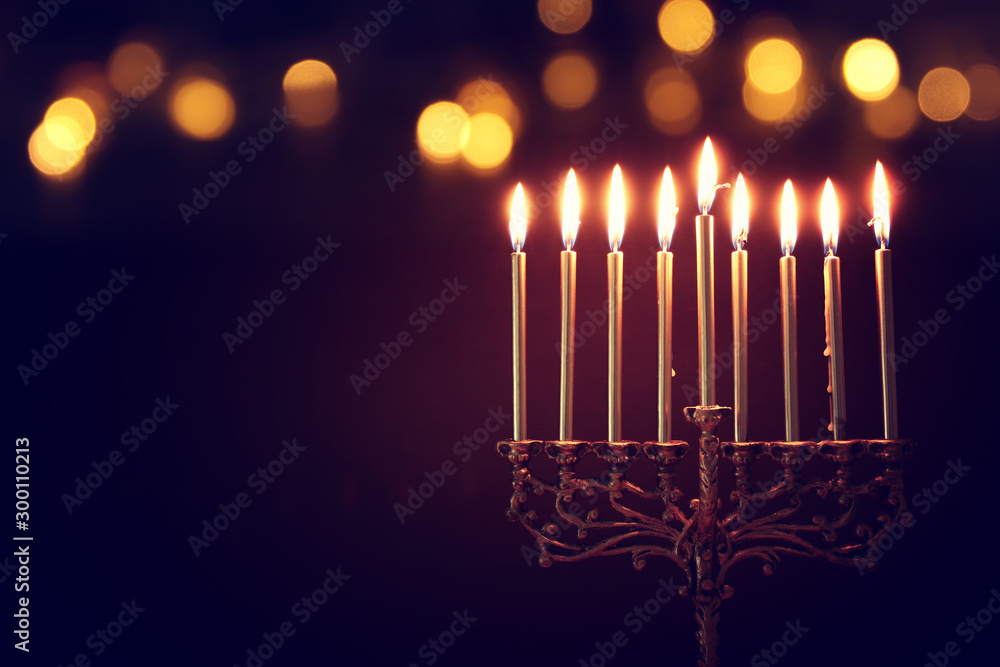 Religion image of jewish holiday Hanukkah background with menorah