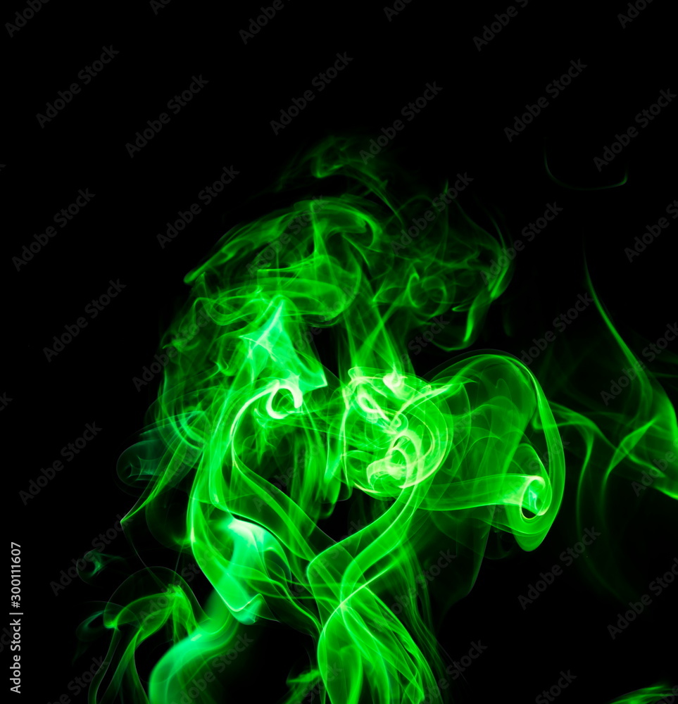 Green smoke on black background