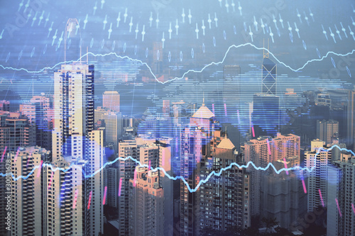 Forex graph on city view with skyscrapers background multi exposure. Financial analysis concept.