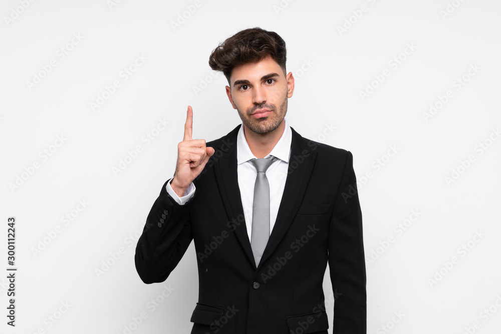 Young businessman over isolated white background pointing with the index finger a great idea Young businessman over isolated white background pointing with the index finger a great idea