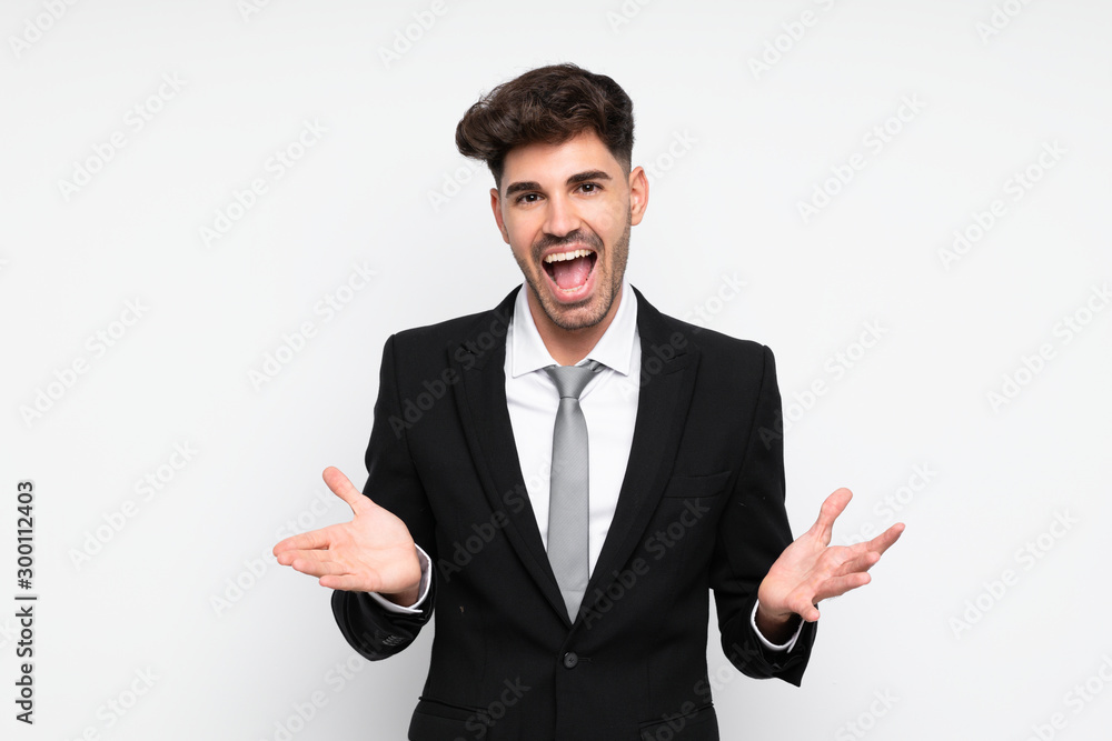 Young businessman over isolated white background unhappy and frustrated with something