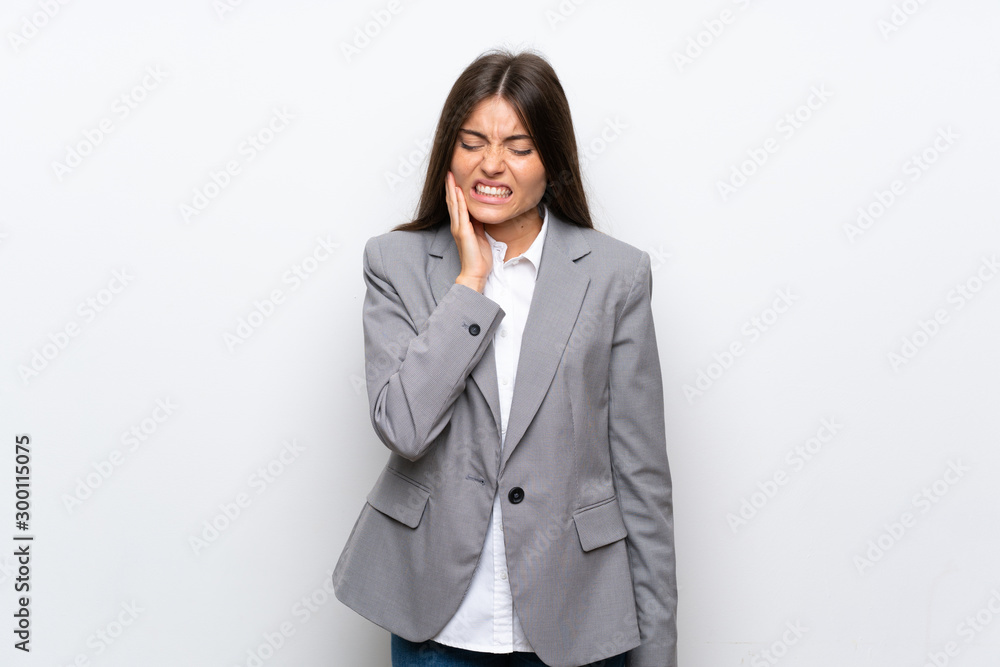Young business woman over isolated white background with toothache Young business woman over isolated white background with toothache