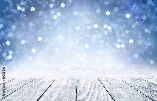 Decorative Christmas background with bokeh lights and snowflakes. © preto_perola