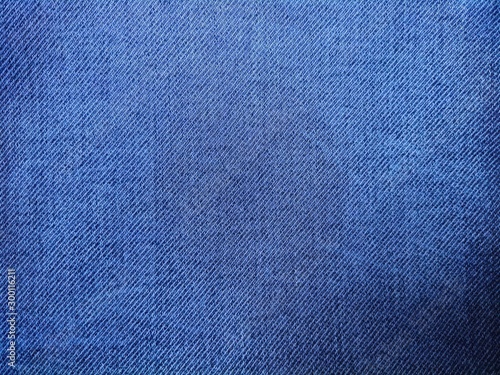 Closeup jeans fabric texture. Denim jeans background.