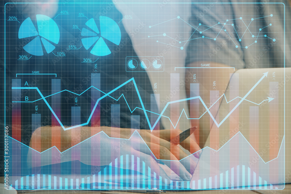 Forex graph with businessman typing on computer in office on background. Concept of analysis. Double exposure. Forex graph with businessman typing on computer in office on background. Concept of analysis. Double exposure.