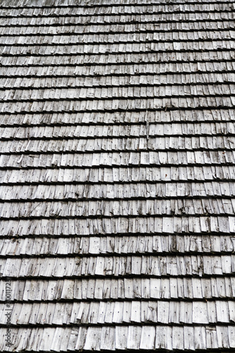 Closeup. Background. Dark wood texture. Traditional rustic wooden roof from Poland