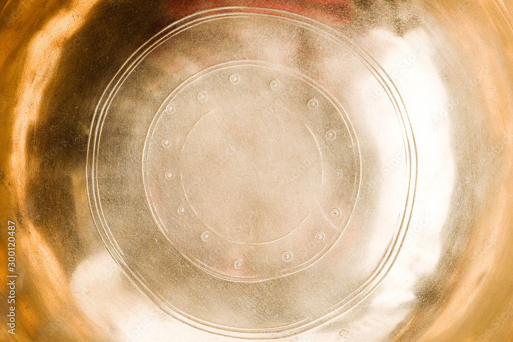 Texture and background of a copper singing bowl Texture and background of a copper singing bowl