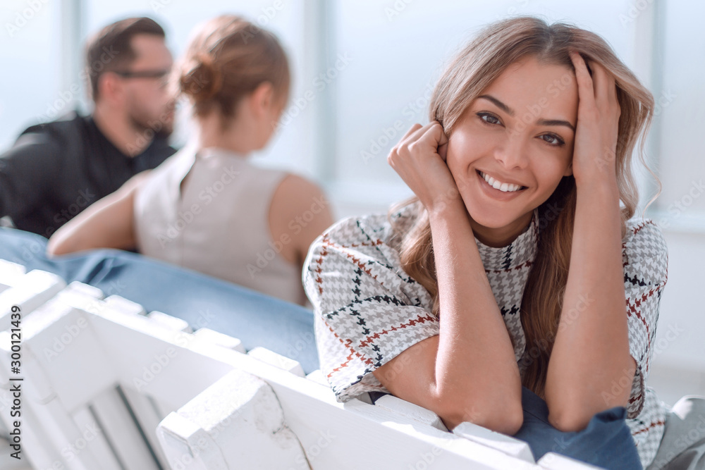 young business woman sitting in office lobby at coffee break young business woman sitting in office lobby at coffee break