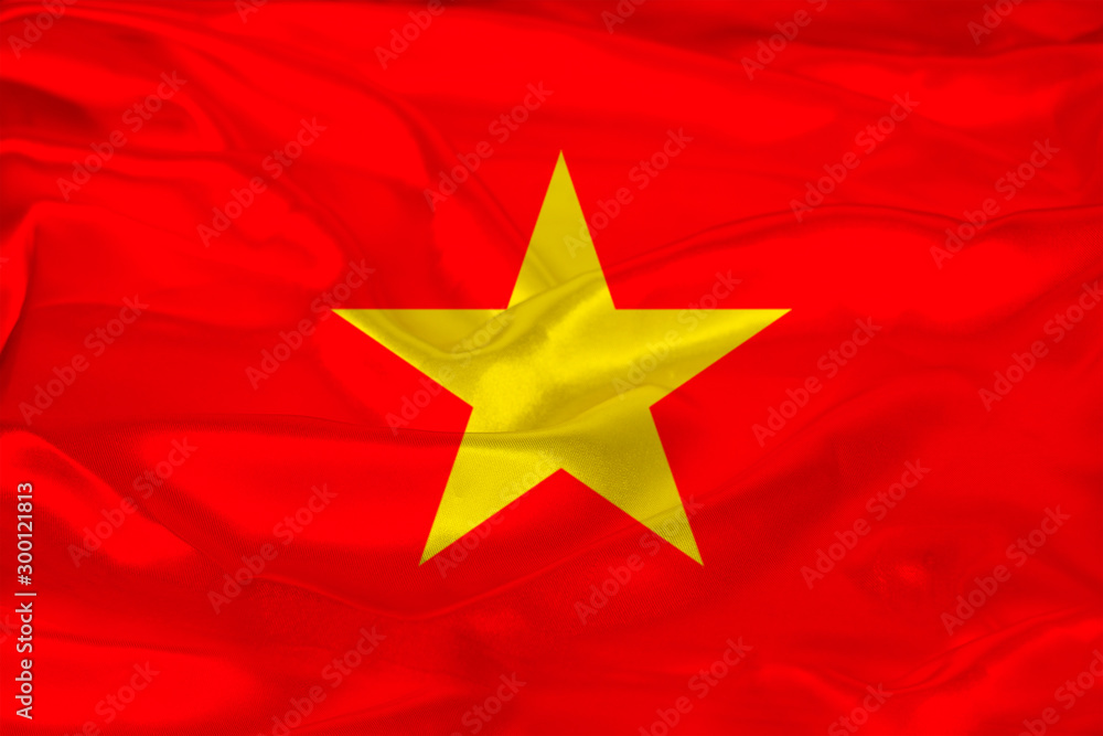 beautiful photo of the colored national flag of the modern state of Vietnam on a textured fabric, concept of tourism, emigration, economy and politics, closeup beautiful photo of the colored national flag of the modern state of Vietnam on a textured fabric, concept of tourism, emigration, economy and politics, closeup