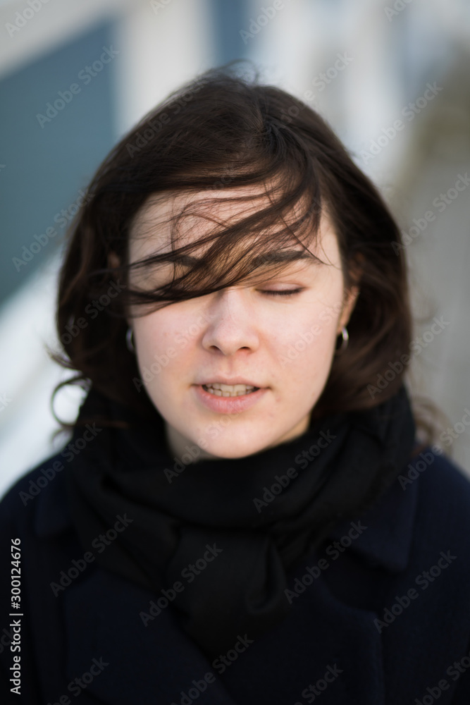Portrait of young woman walking on pier Portrait of young woman walking on pier