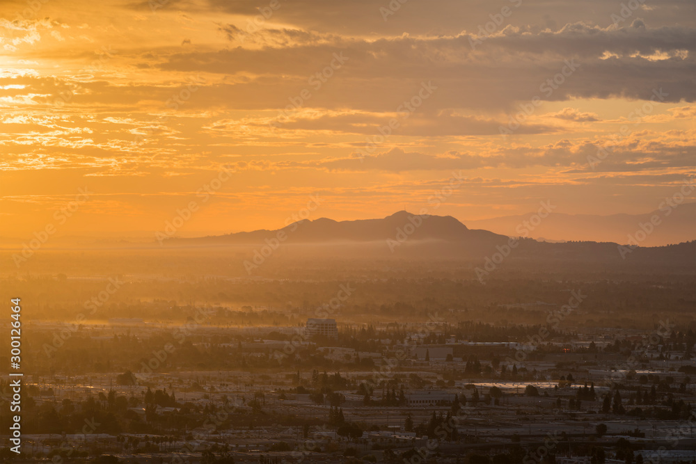 Los Angeles sunrise view across the San Fernando Valley towards Griffith Park in Southern California.  