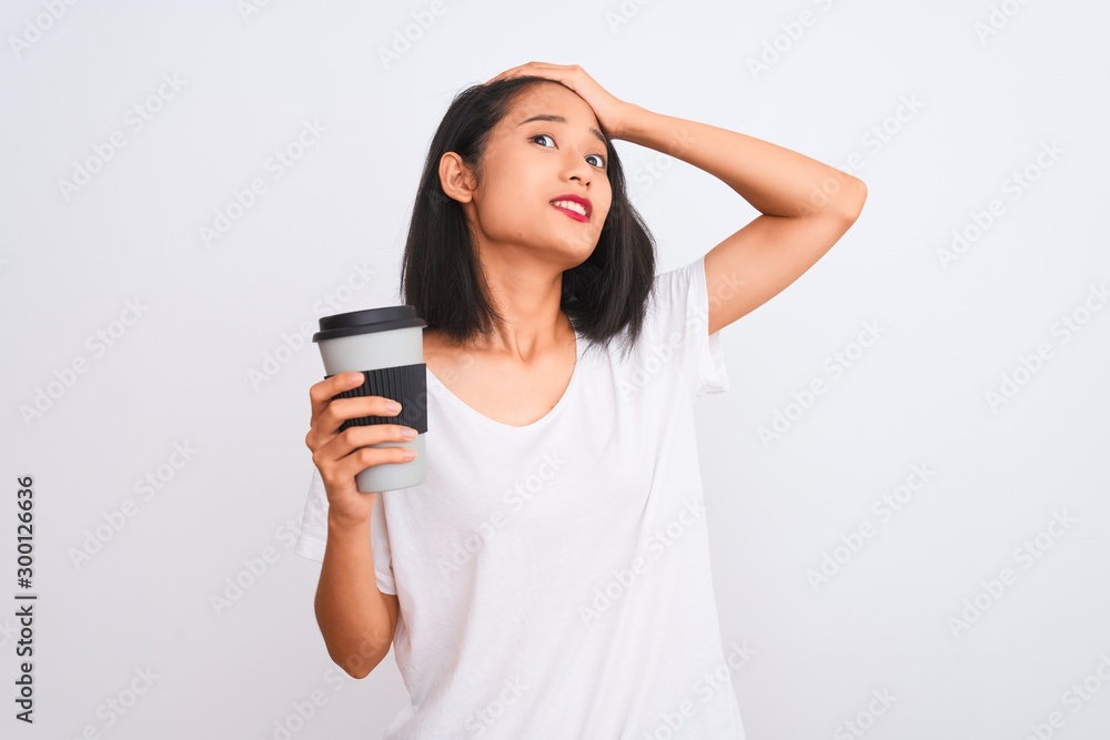 Young chinese woman drinking take away glass of coffee over isolated white background stressed with hand on head, shocked with shame and surprise face, angry and frustrated Young chinese woman drinking take away glass of coffee over isolated white background stressed with hand on head, shocked with shame and surprise face, angry and frustrated