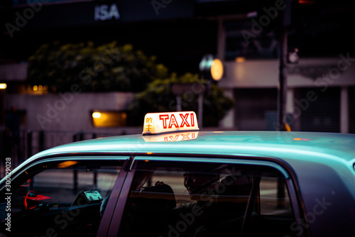 Honk Kong night taxi sign