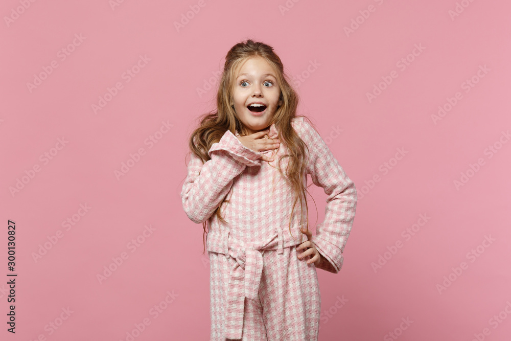Little cute one kid girl 4-5 years old wearing rose clothes isolated on bright pink wall background, children studio portrait. People sincere emotions, childhood lifestyle concept. Mock up copy space. Little cute one kid girl 4-5 years old wearing rose clothes isolated on bright pink wall background, children studio portrait. People sincere emotions, childhood lifestyle concept. Mock up copy space.