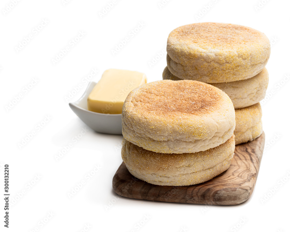 Freshly baked English muffins isolated on a white Freshly baked English muffins isolated on a white