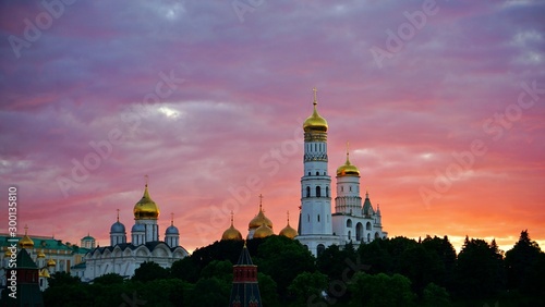 Amazing view of Moscow Kremlin at sunset with red and purple clouds © MKozloff