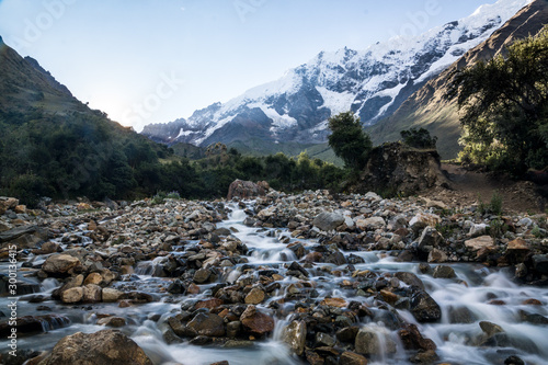 River with wild mountain background