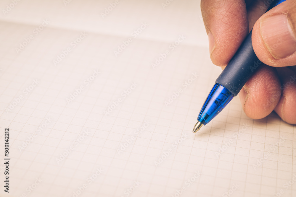 Hand Writing on Blank Grid Notebook Hand Writing on Blank Grid Notebook
