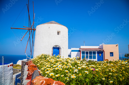 Windmill in Oia village on Santorini island  Greece