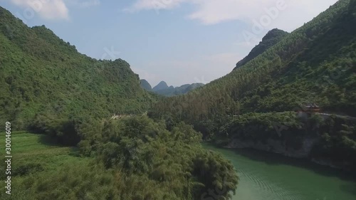 Cityscape of Yizhou with karst hills, Guangxi Province, China. Aerial view of the natural landscape and the village. photo