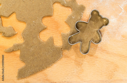 christmas gingerbread cookies on wooden background photo