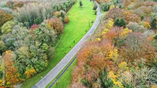 4k Aerial view of Merlin park with autumn trees and vegetation, Galway, Ireland