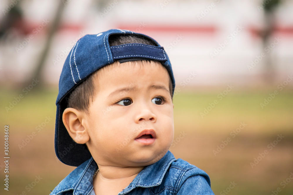 Cute Asian boy wearing a cap Cute Asian boy wearing a cap