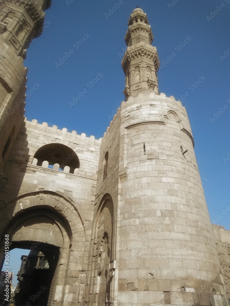 Cairo , Egypt - 02.11:2019:mosque , old market and tourists in the ancient Cairo city