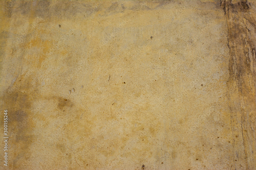 Concrete surface painted in light pastel colors with a rough texture. Concrete surface painted in light pastel colors with a rough texture.