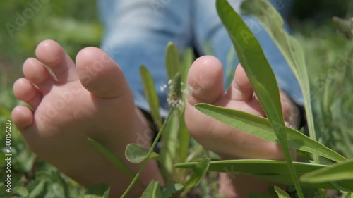 Bare foot in the grass.