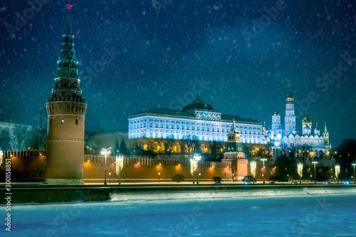 Moscow. Russia. Kremlin. Snow is falling in Moscow at night. Grand Kremlin Palace. Winter Russia. Kremlin towers at night. Car travel in Moscow. Christmas holidays in Russia. Sights. Russian roads