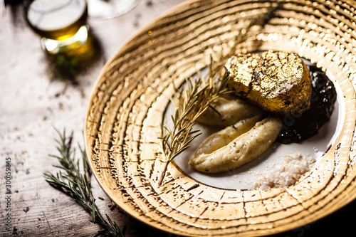 Black Angus tenderloin steak covered with 24 carat gold photo