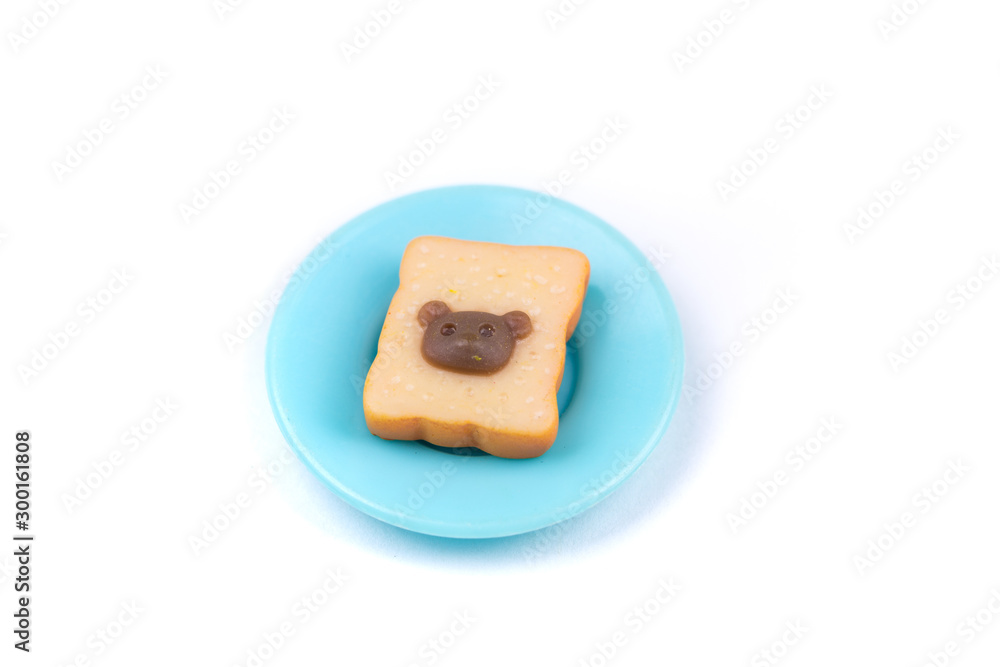 Childs toy plastic food molded 1/6th scale toast with chocolate hazelnut bears head on a plate